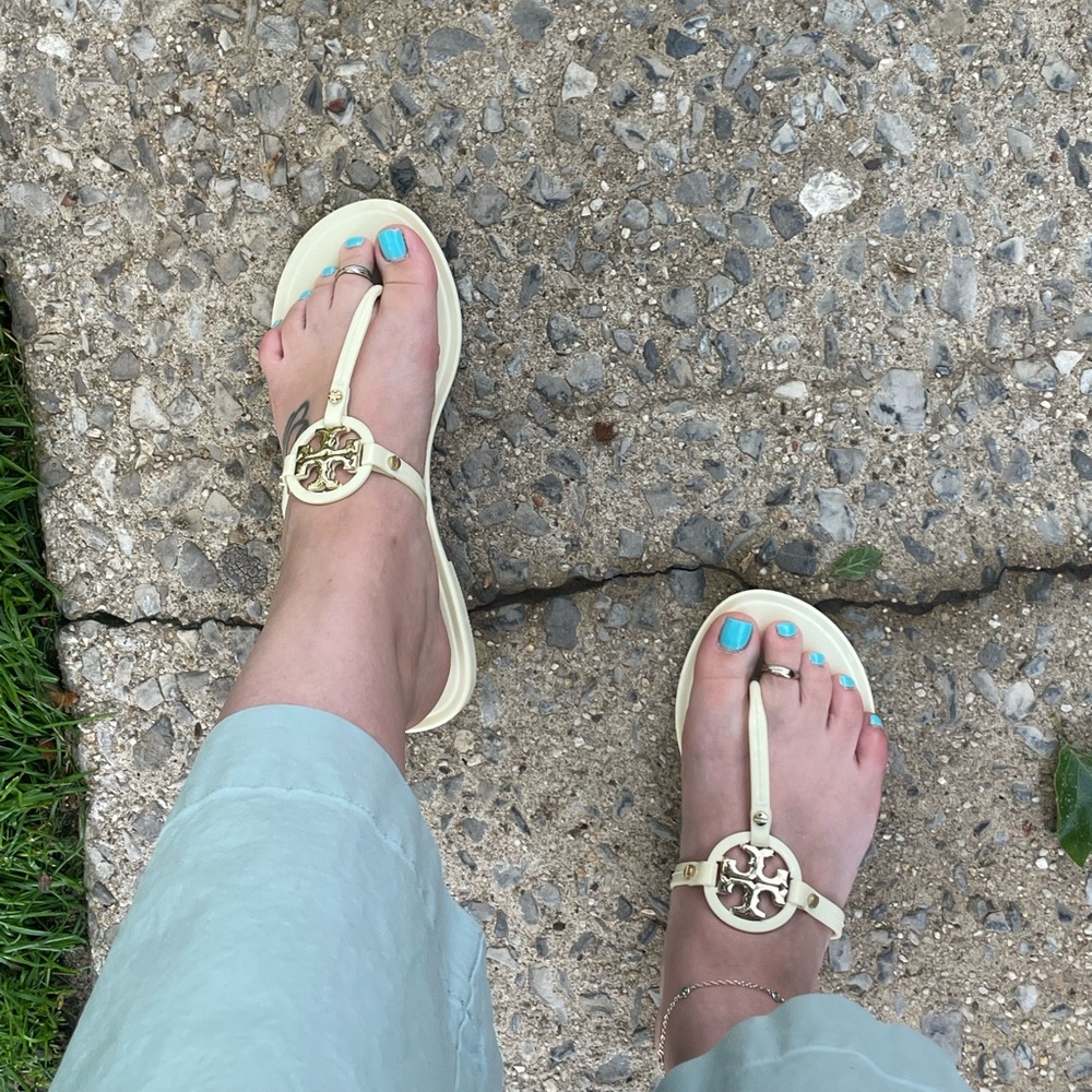 Tory Burch cream flip flops